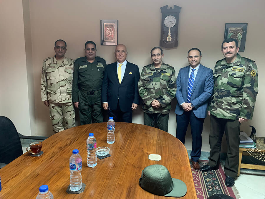 Members of the Egyptian military pose with ThinkRF executives as they sign a new contract